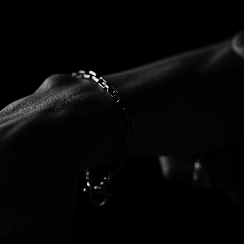 man wearing sterling silver rings and bracelet