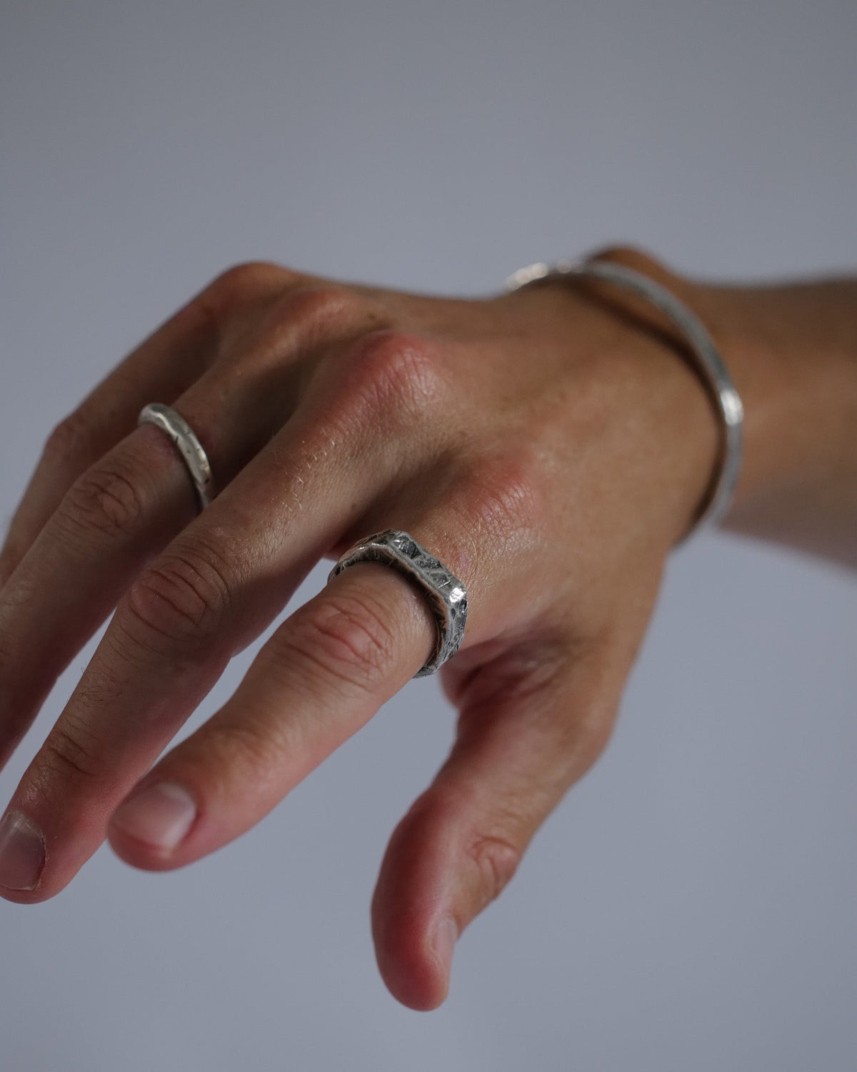 Model wearing the Cruz Ring handcrafted from solid 925 sterling silver.