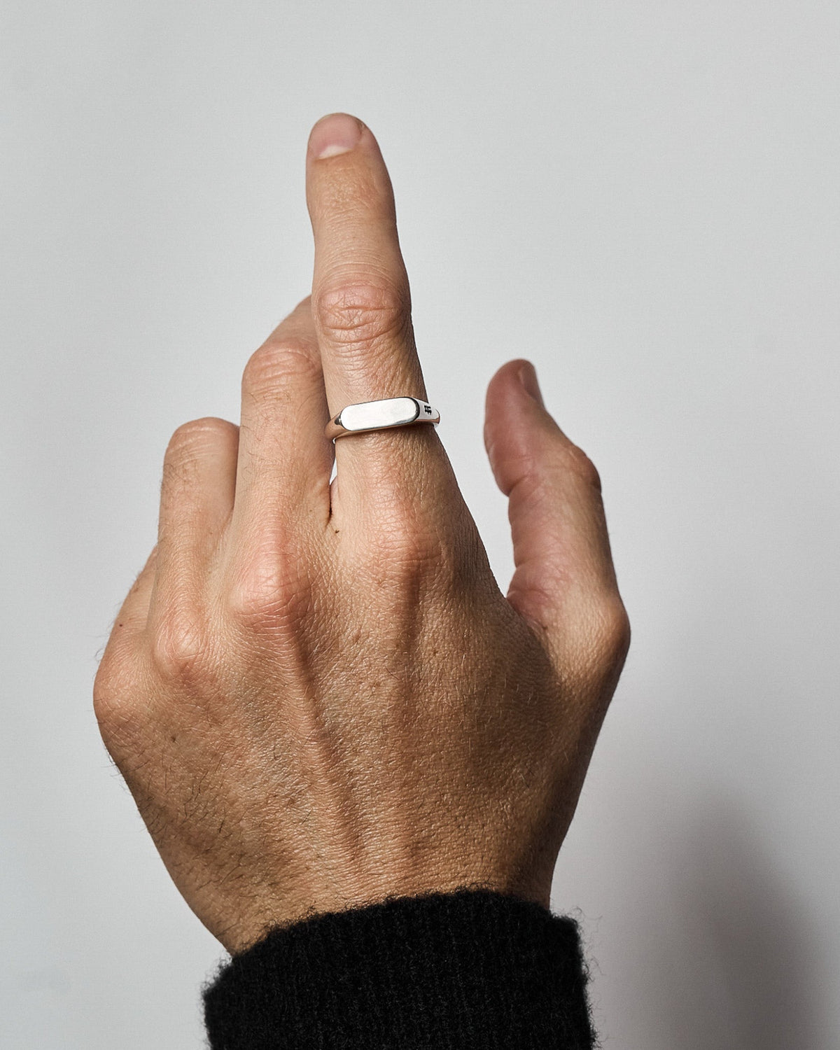 Model wearing the Lenny Ring handcrafted from solid 925 sterling silver.