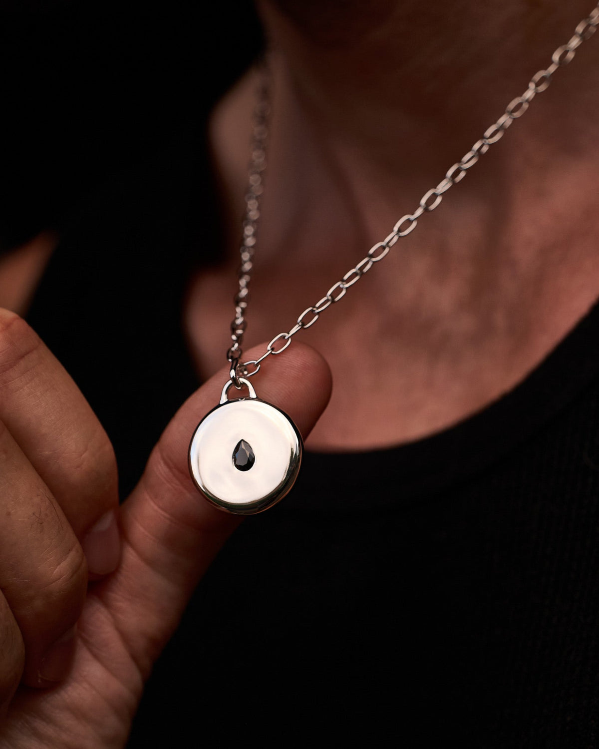 Teardrop Pendant handcrafted from solid 925 sterling silver featuring a black teardrop stone.
