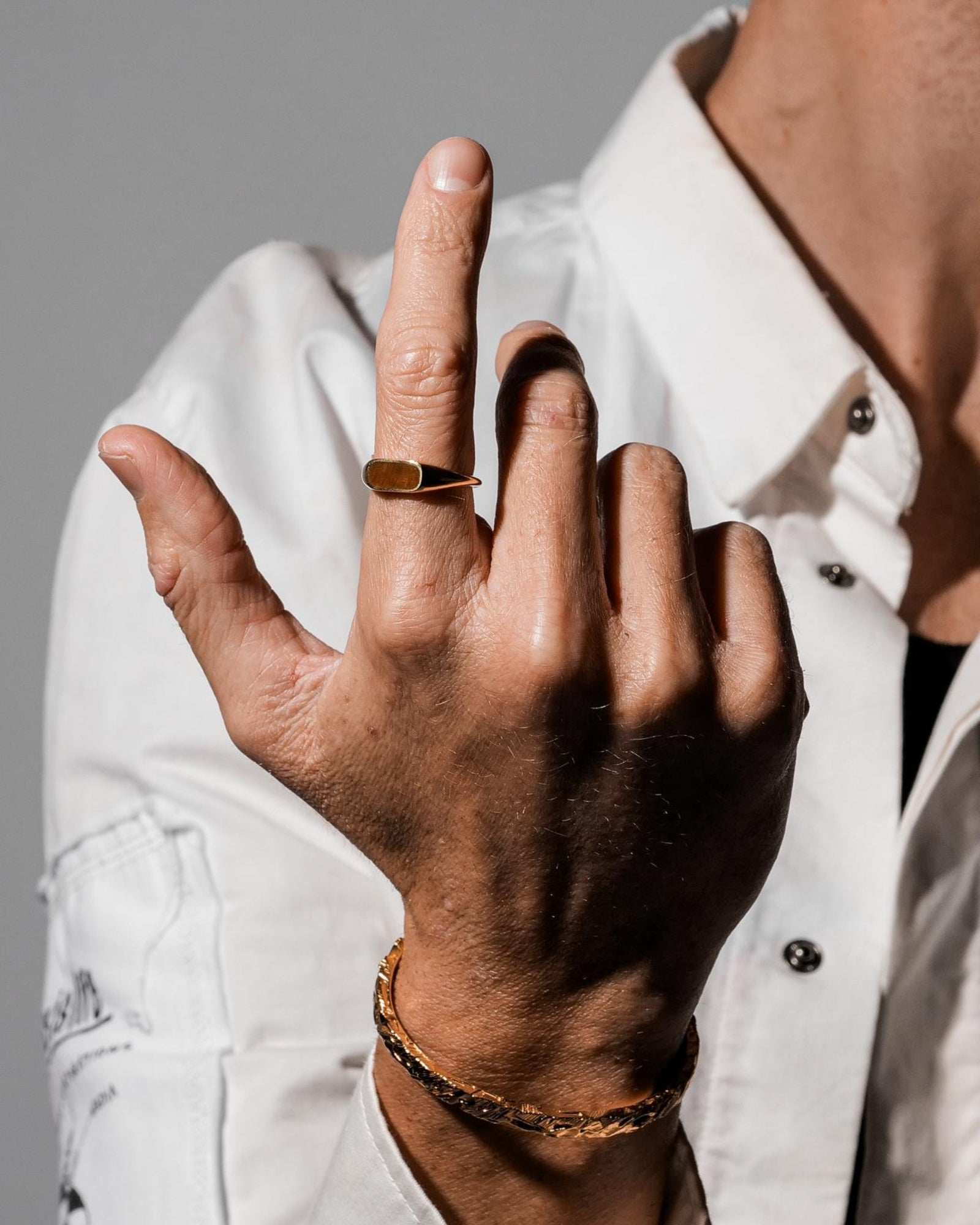 Tigers eye ring worn on a model's hand 1