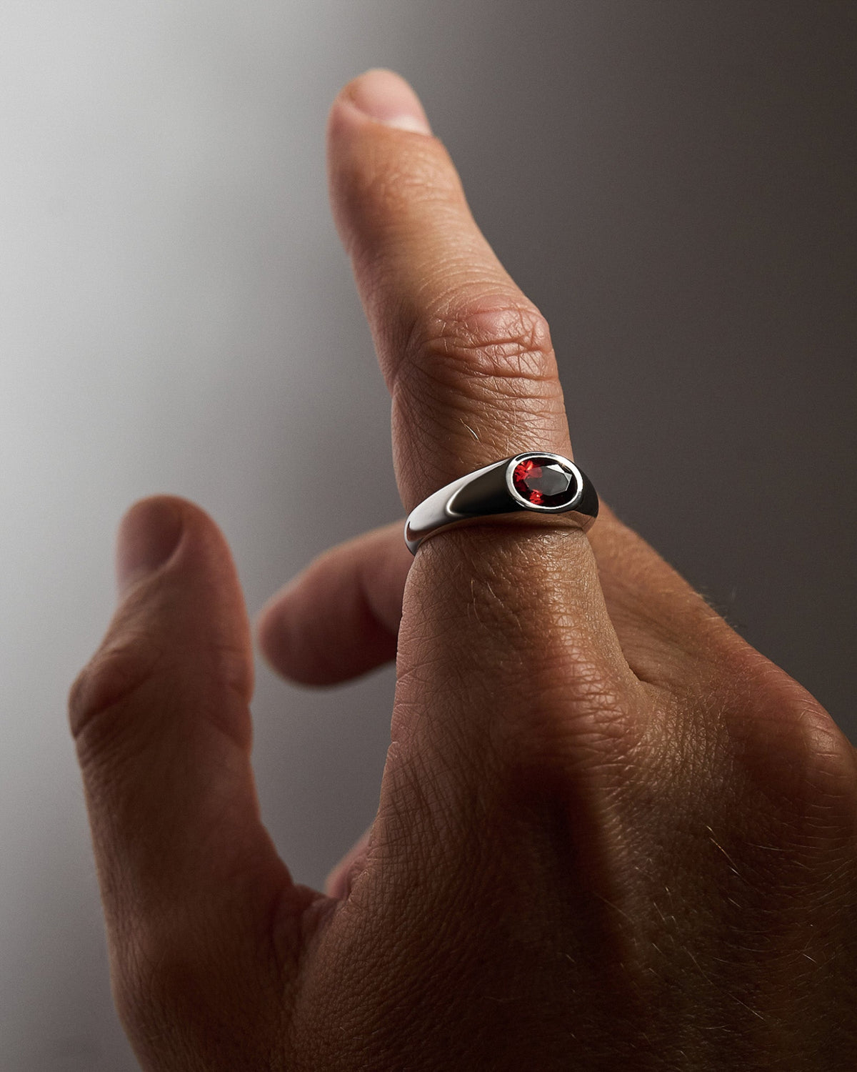 Close-up of the Yuki Red Garnet Ring featuring genuine red garnet set in solid 925 sterling silver.