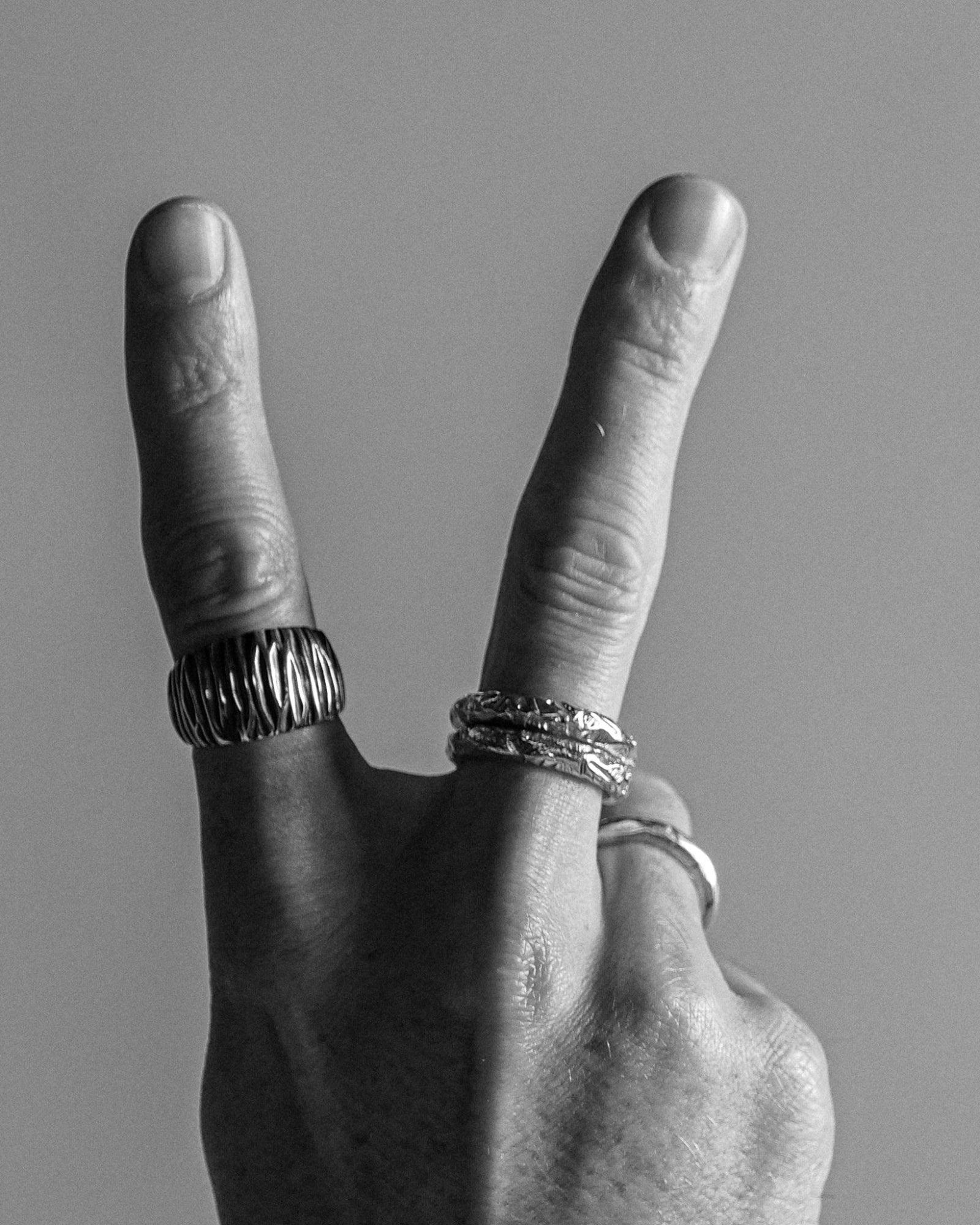 Otis ring worn on a model's hand 1